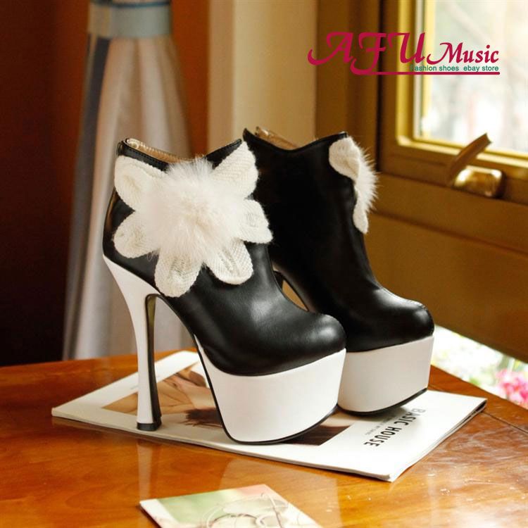white and black high heel boots